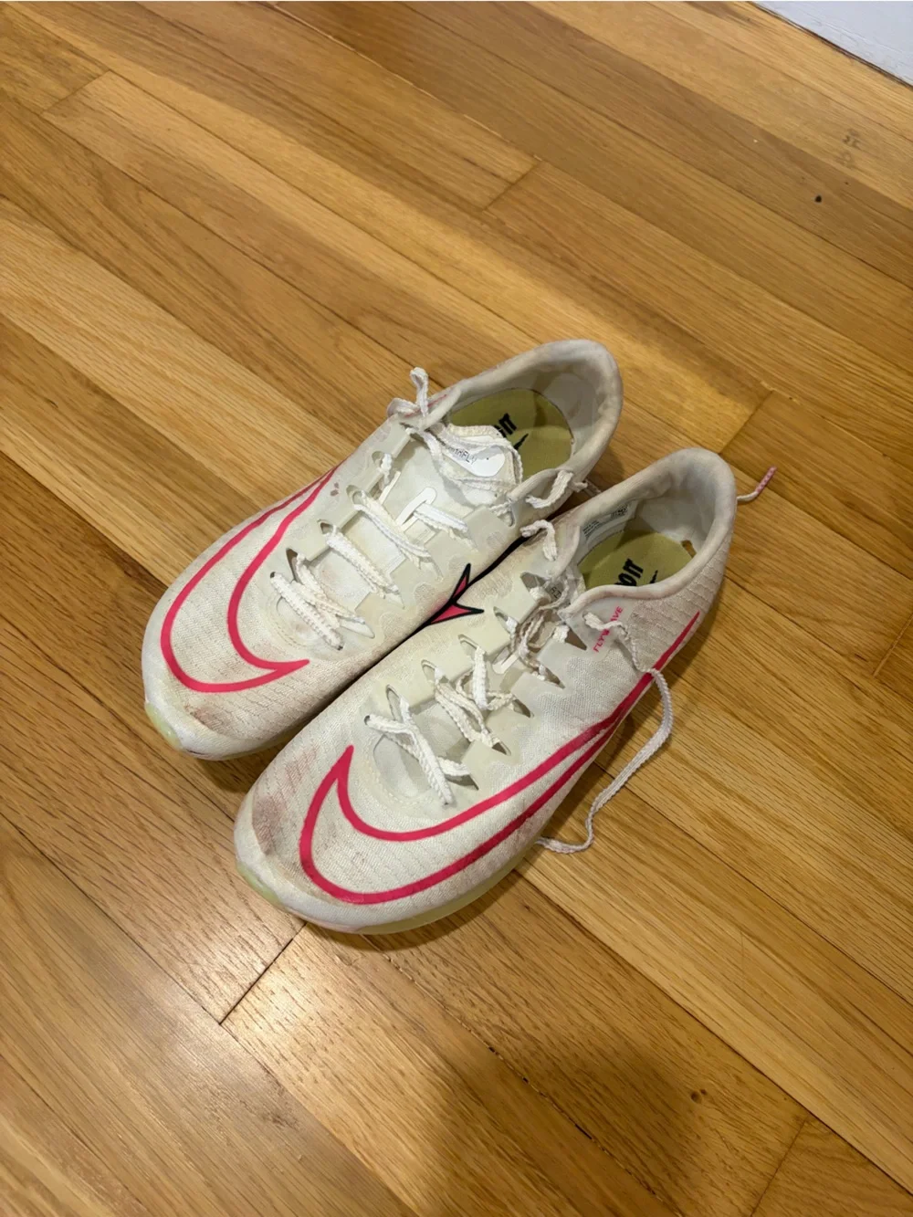 Nike White & Pink Women's Athletic track spikes